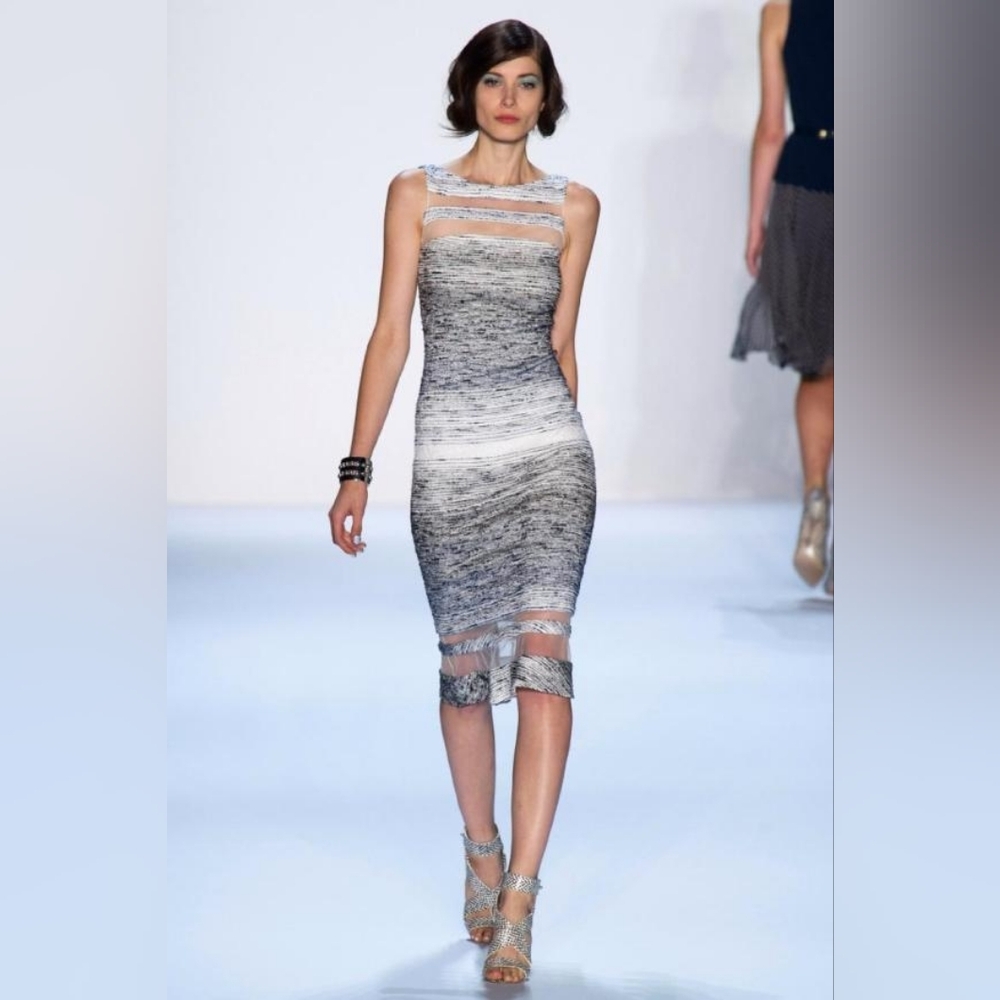 Midi length bodycon mesh cut out fluted dress